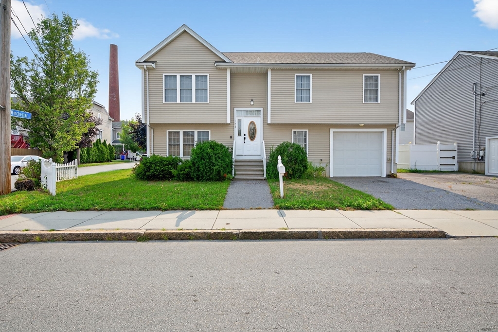 172 Stevens Street Fall River, MA 02721 - Photo 1 of 32 a front view of house with yard and green space
