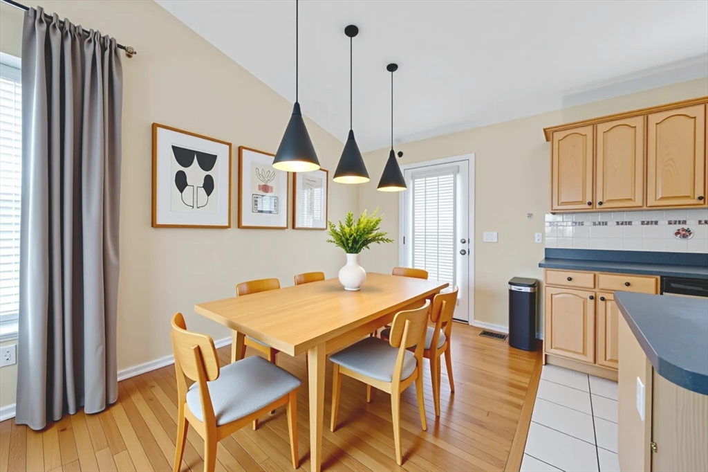 172 Stevens Street Fall River, MA 02721 - Photo 11 of 32 a view of a dining room with furniture and wooden floor