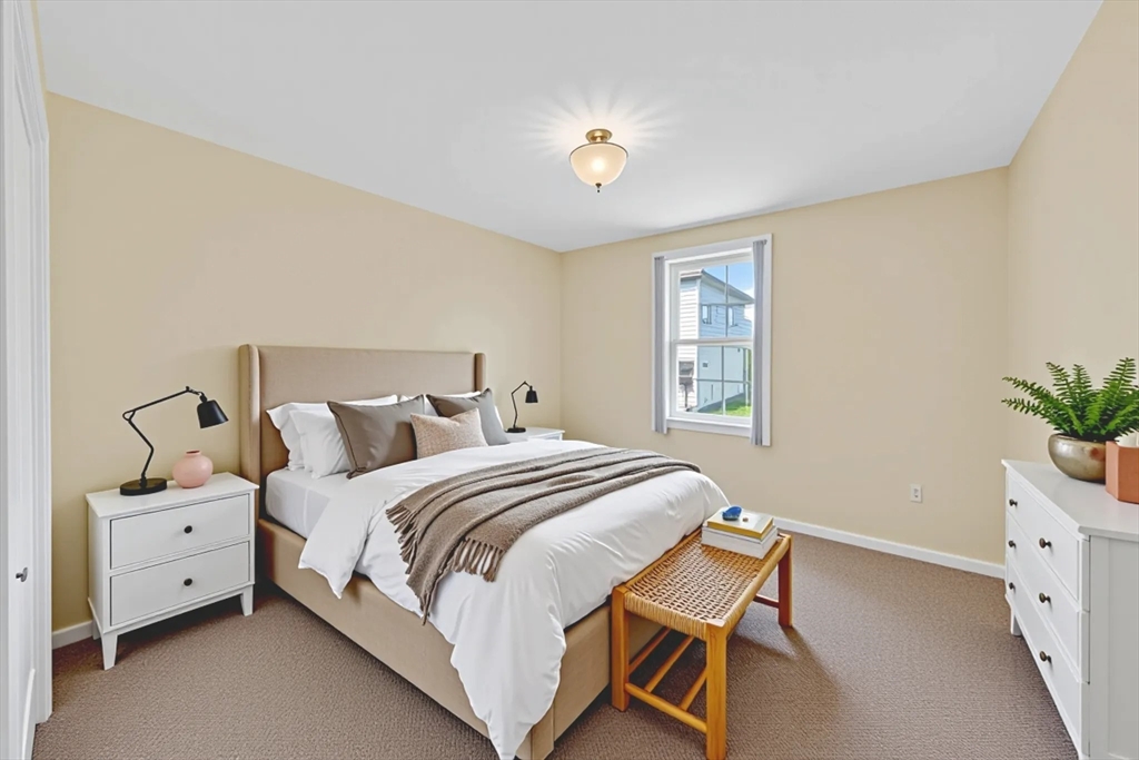172 Stevens Street Fall River, MA 02721 - Photo 22 of 32 a bedroom with a bed and a window