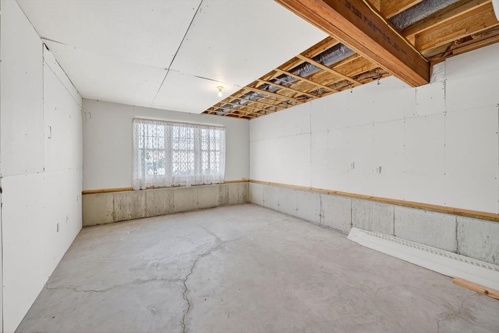 172 Stevens Street Fall River, MA 02721 - Photo 26 of 32 a view of an empty room with a window