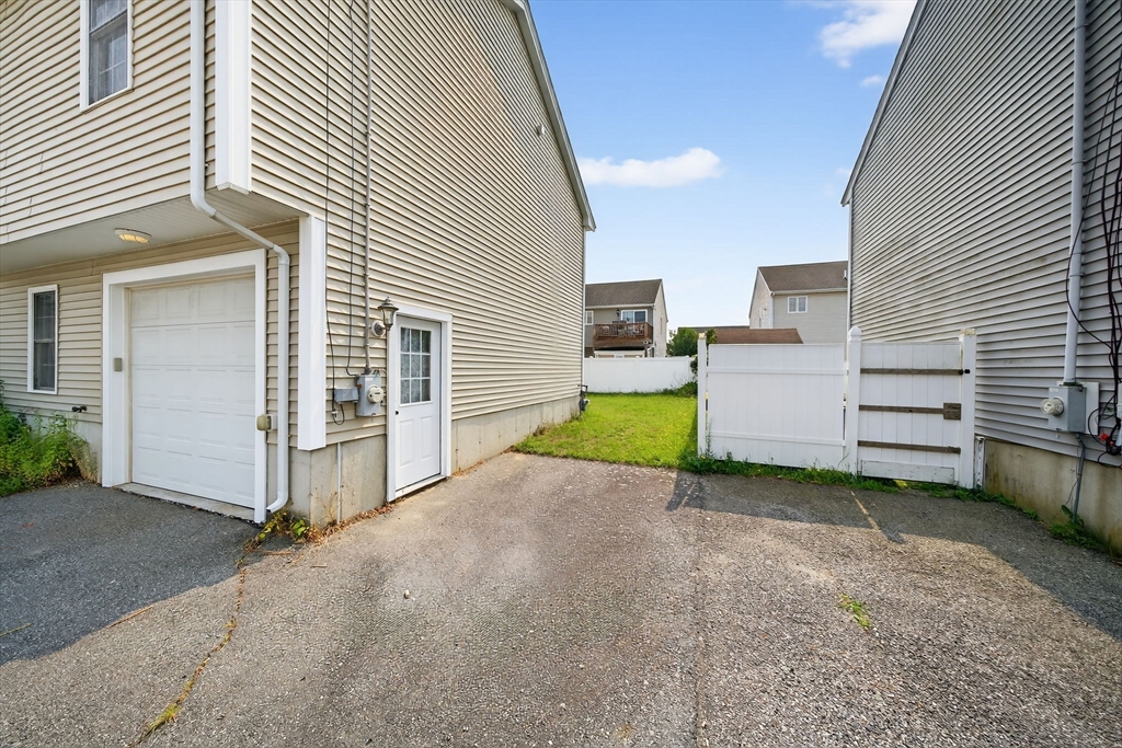 172 Stevens Street Fall River, MA 02721 - Photo 3 of 32 a view of a house with backyard