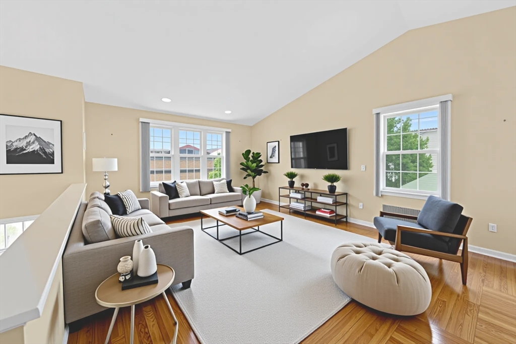 172 Stevens Street Fall River, MA 02721 - Photo 9 of 32 a living room with furniture and a flat screen tv