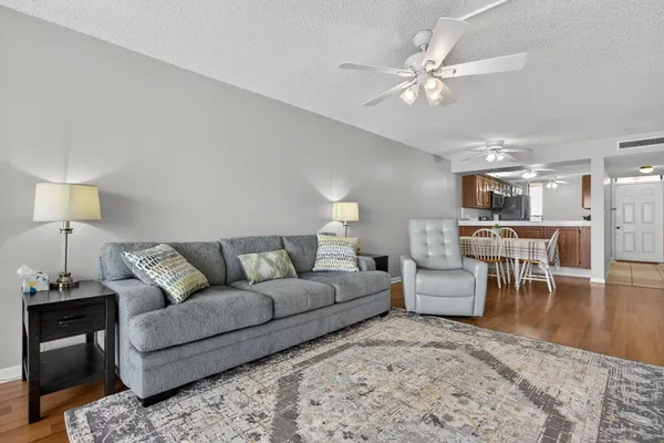 a living room with furniture and a table