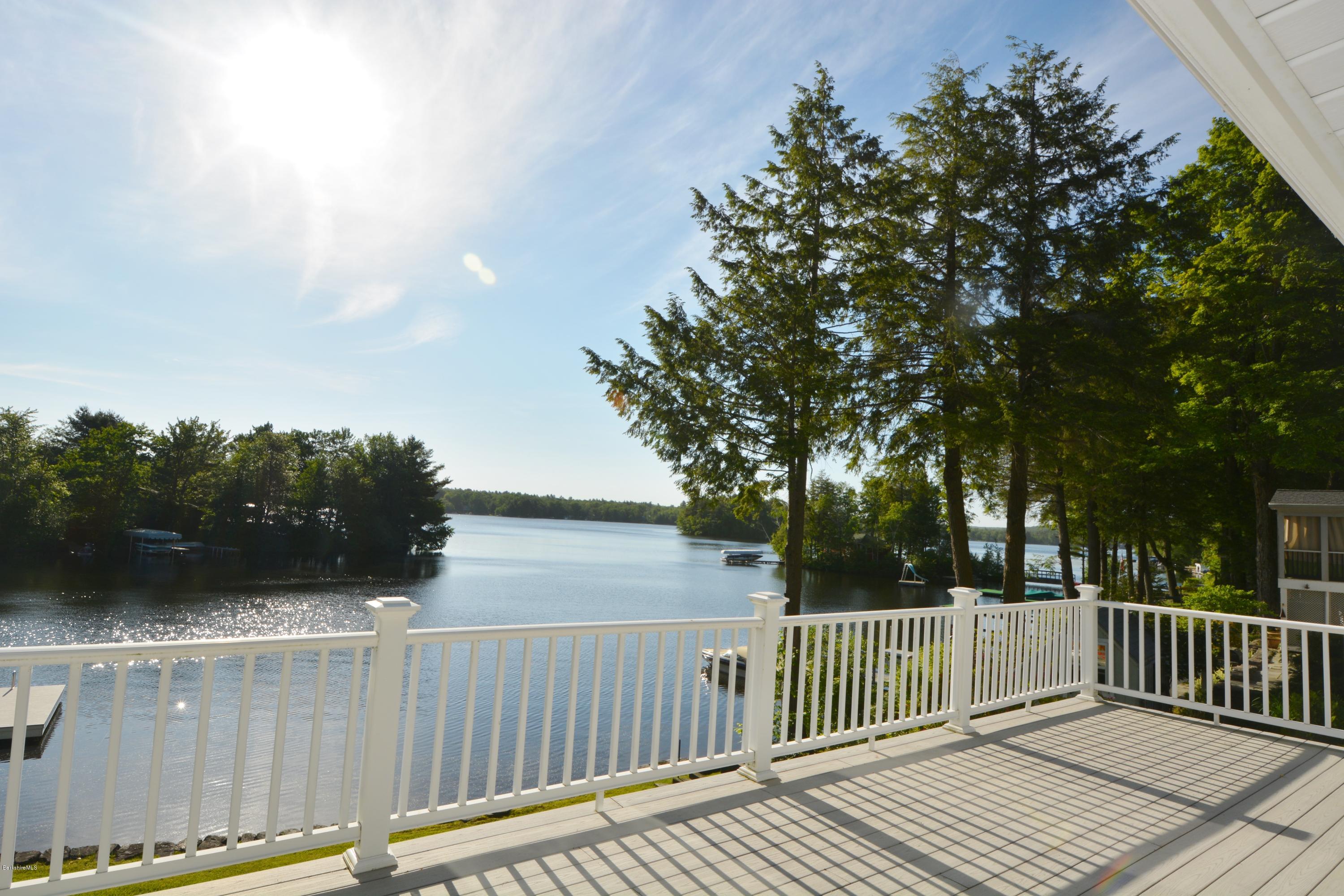 633 Pine Road Otis, MA 01029 - Photo 18 of 24 a balcony with wooden floor and fence