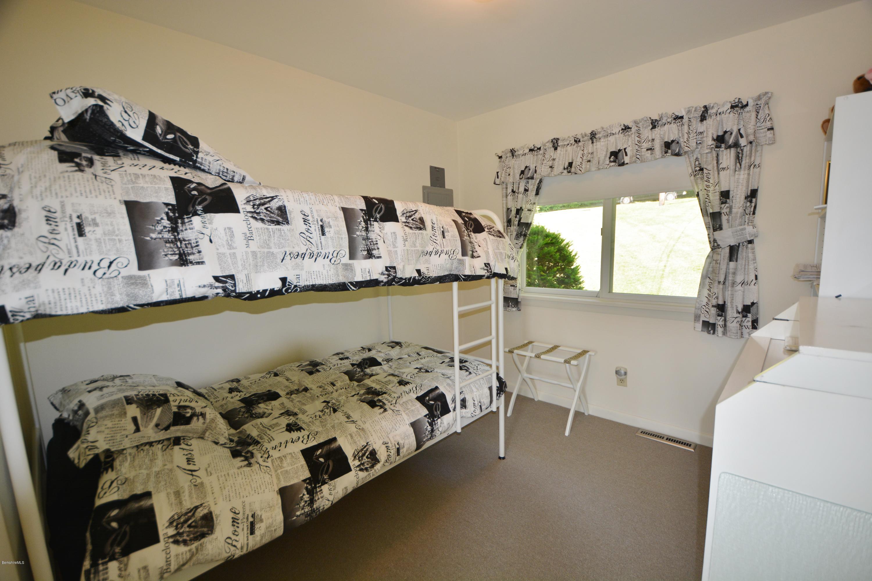 633 Pine Road Otis, MA 01029 - Photo 20 of 24 a view of a bedroom with window