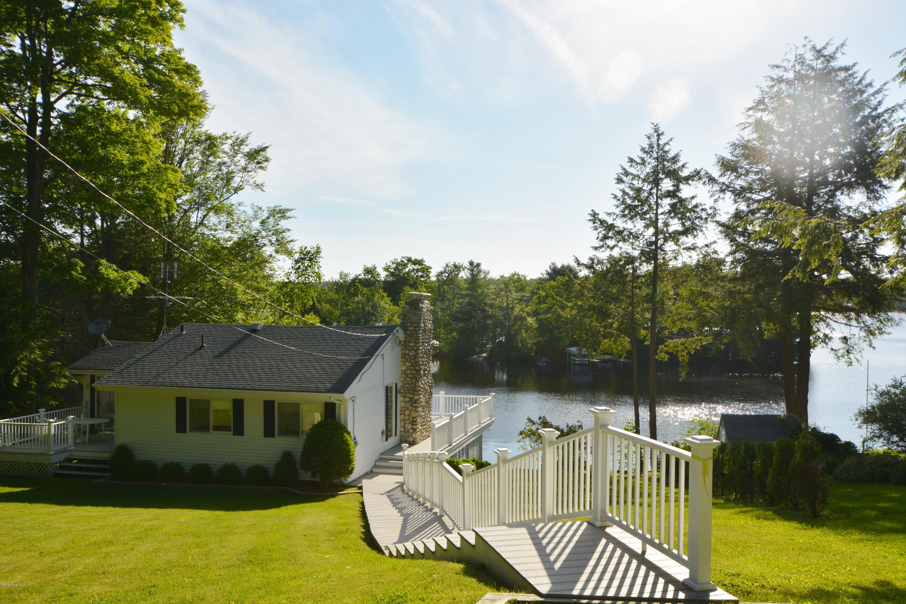 633 Pine Road Otis, MA 01029 - Photo 24 of 24 a front view of house with yard and outdoor seating