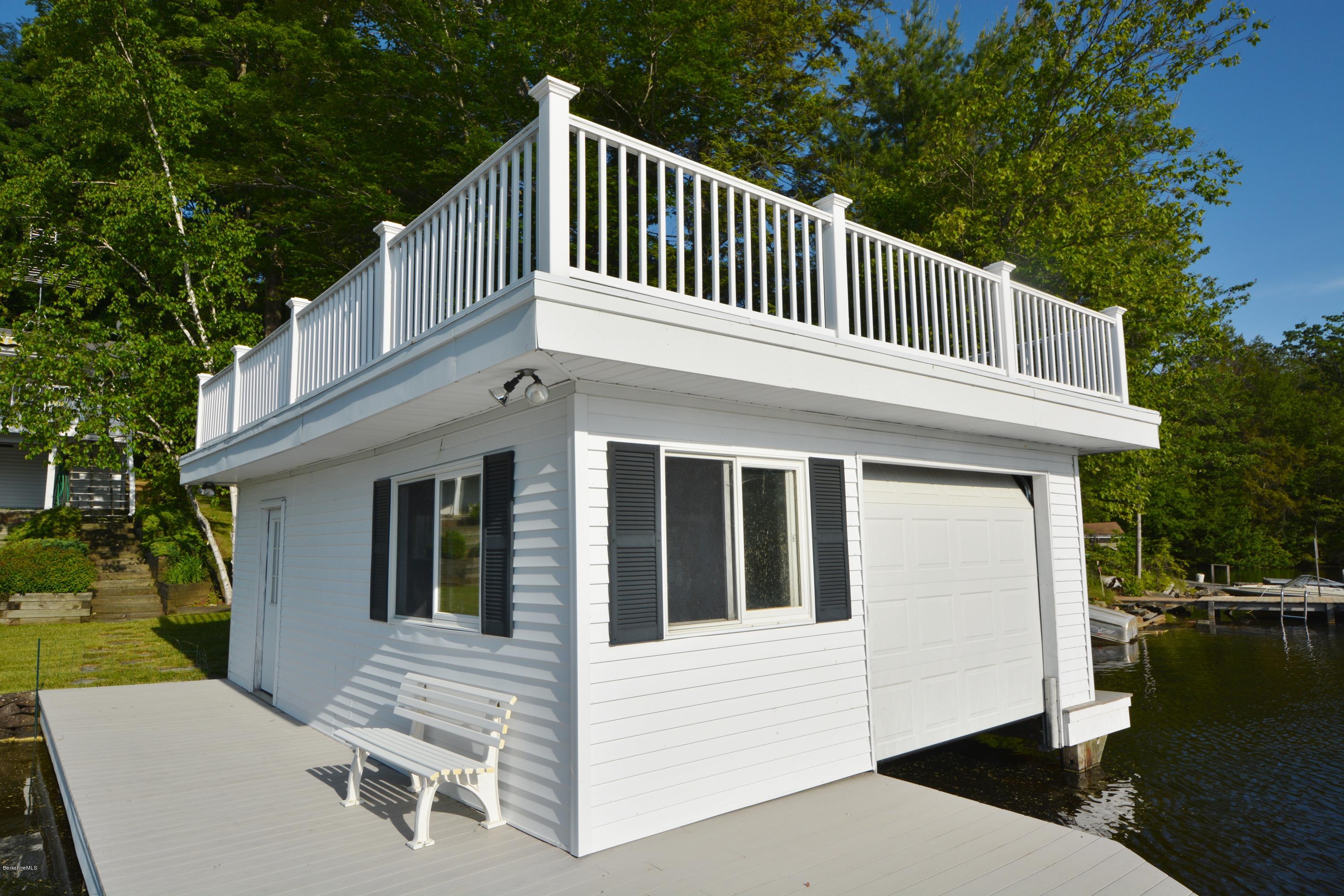 633 Pine Road Otis, MA 01029 - Photo 4 of 24 a view of a house with a deck