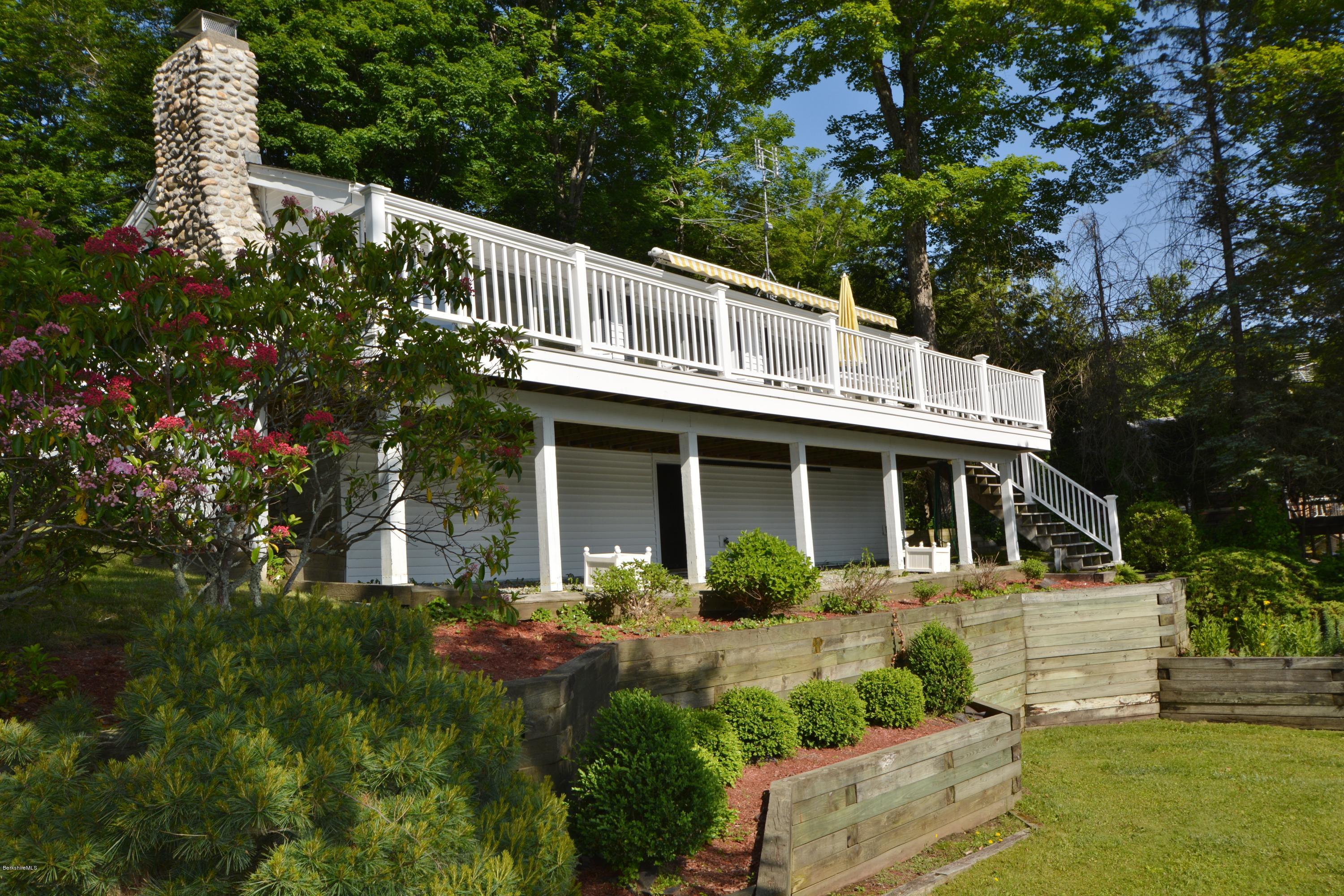 633 Pine Road Otis, MA 01029 - Photo 8 of 24 a front view of a house with garden