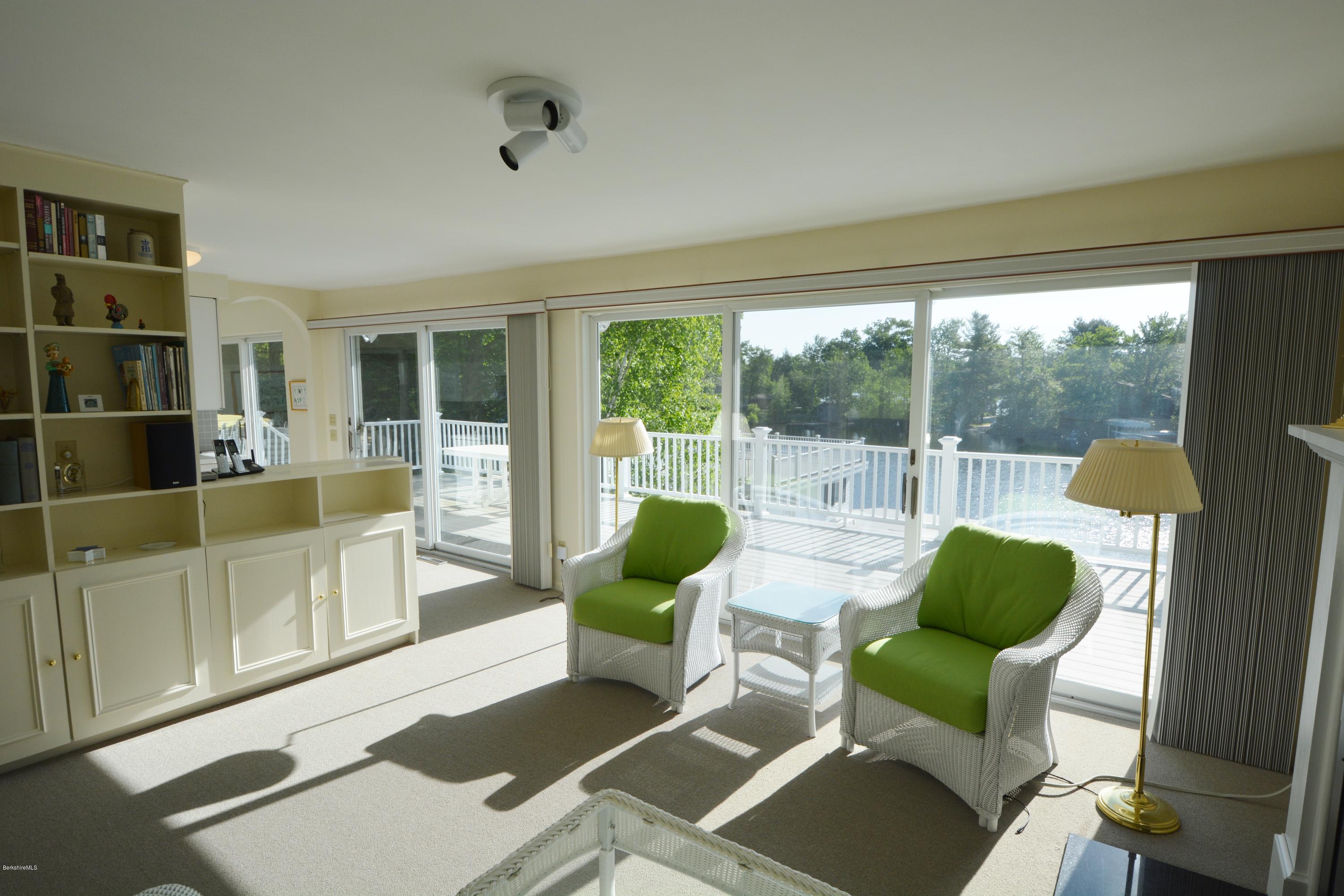 633 Pine Road Otis, MA 01029 - Photo 9 of 24 a living room with furniture and a large window