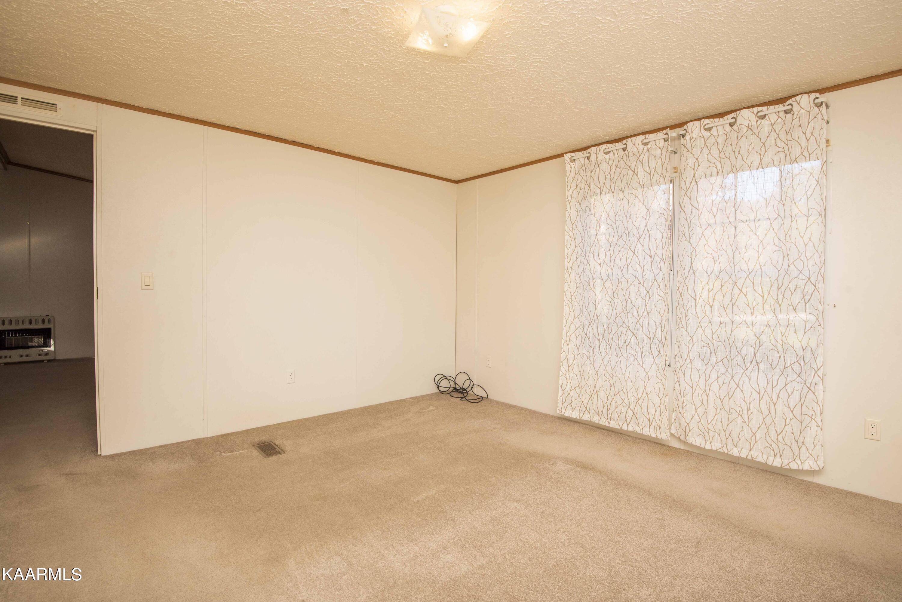 9935 Old Chestnut Ridge Road Heiskell, TN 37754 - Photo 19 of 39 master bed_1