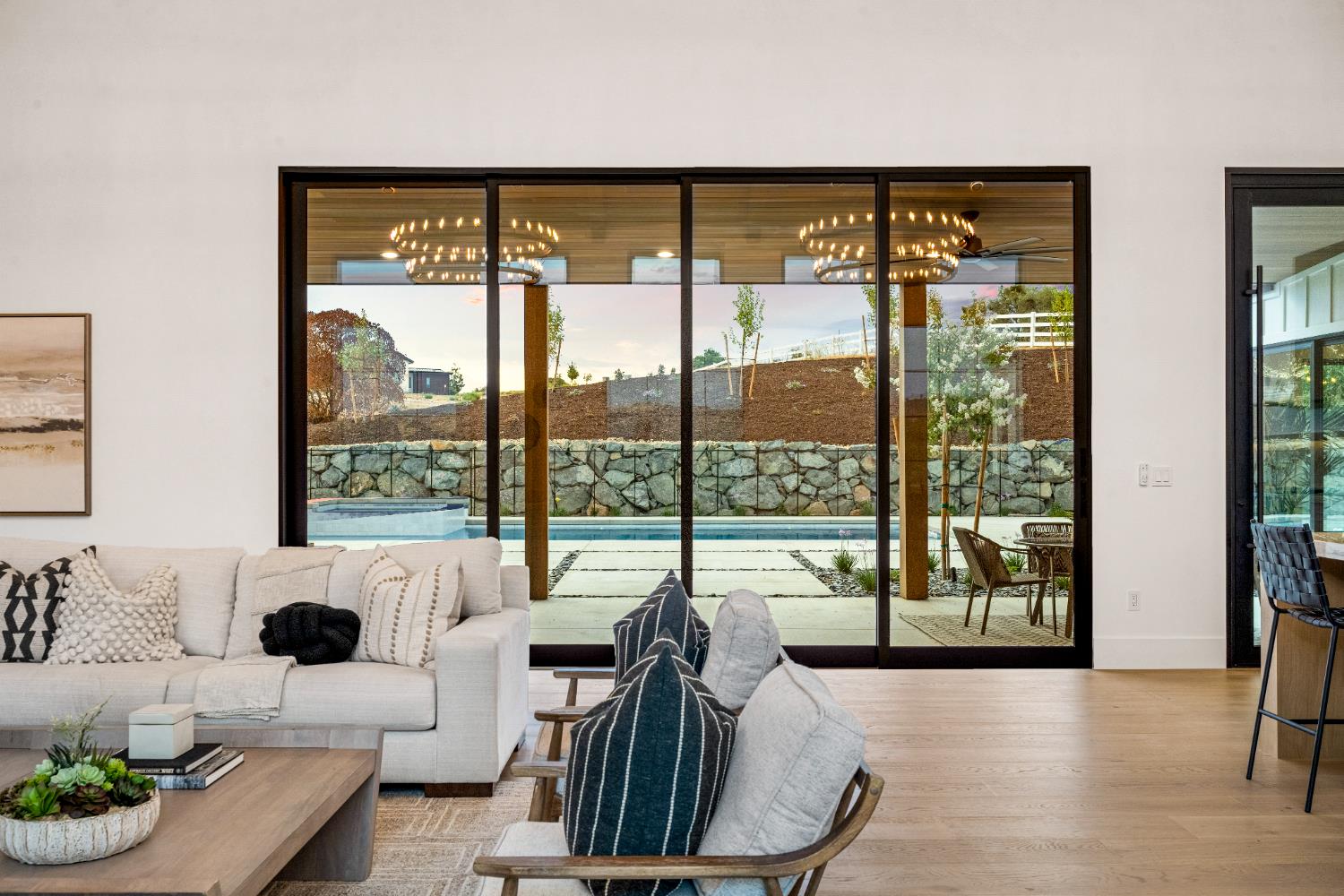 3140 Rattlesnake Road Newcastle, CA 95658 - Photo 14 of 78 a living room with furniture and a floor to ceiling window