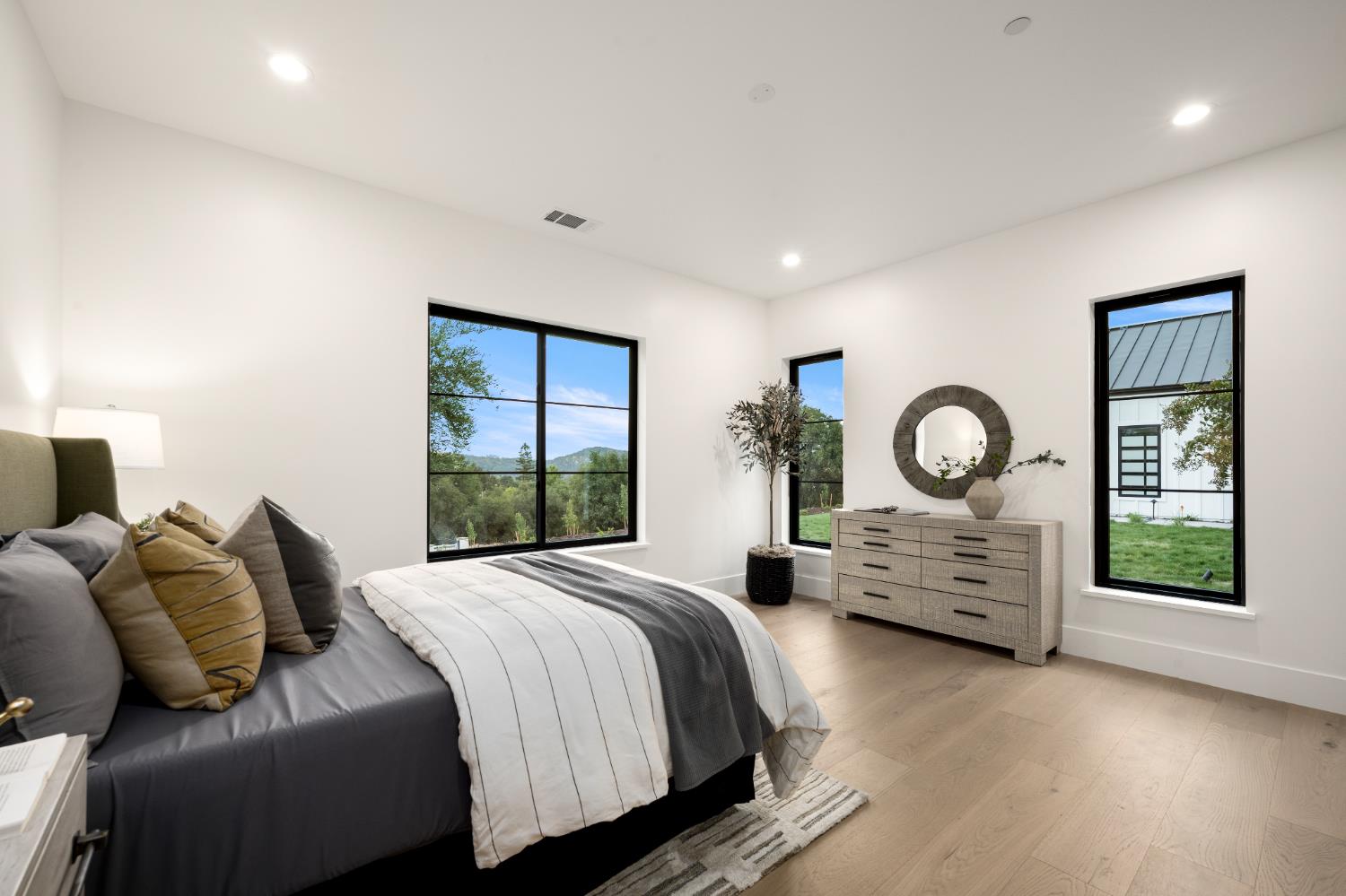 3140 Rattlesnake Road Newcastle, CA 95658 - Photo 22 of 78 a bedroom with a bed and a large window