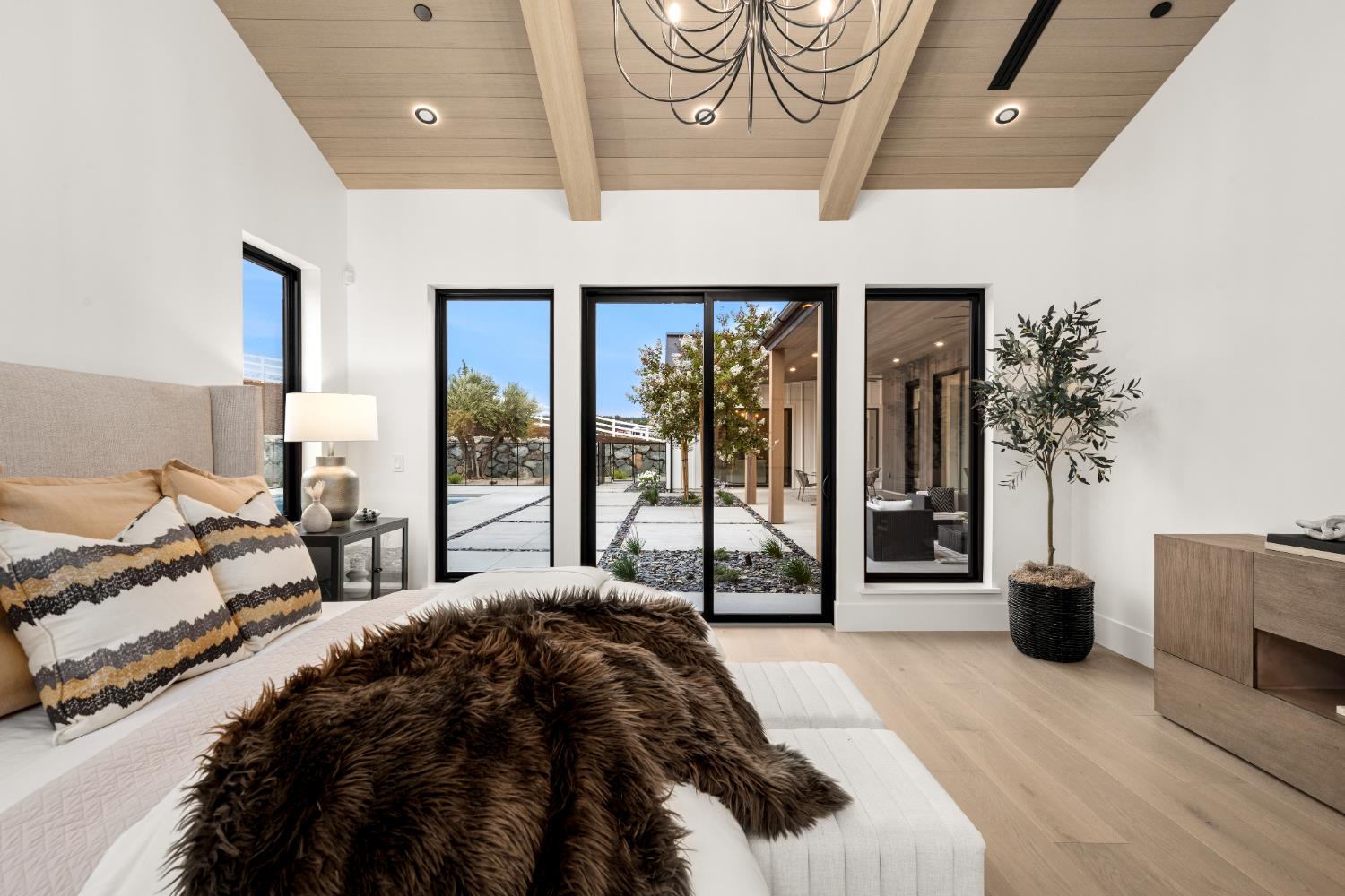 3140 Rattlesnake Road Newcastle, CA 95658 - Photo 37 of 78 a bedroom with a bed and a large window