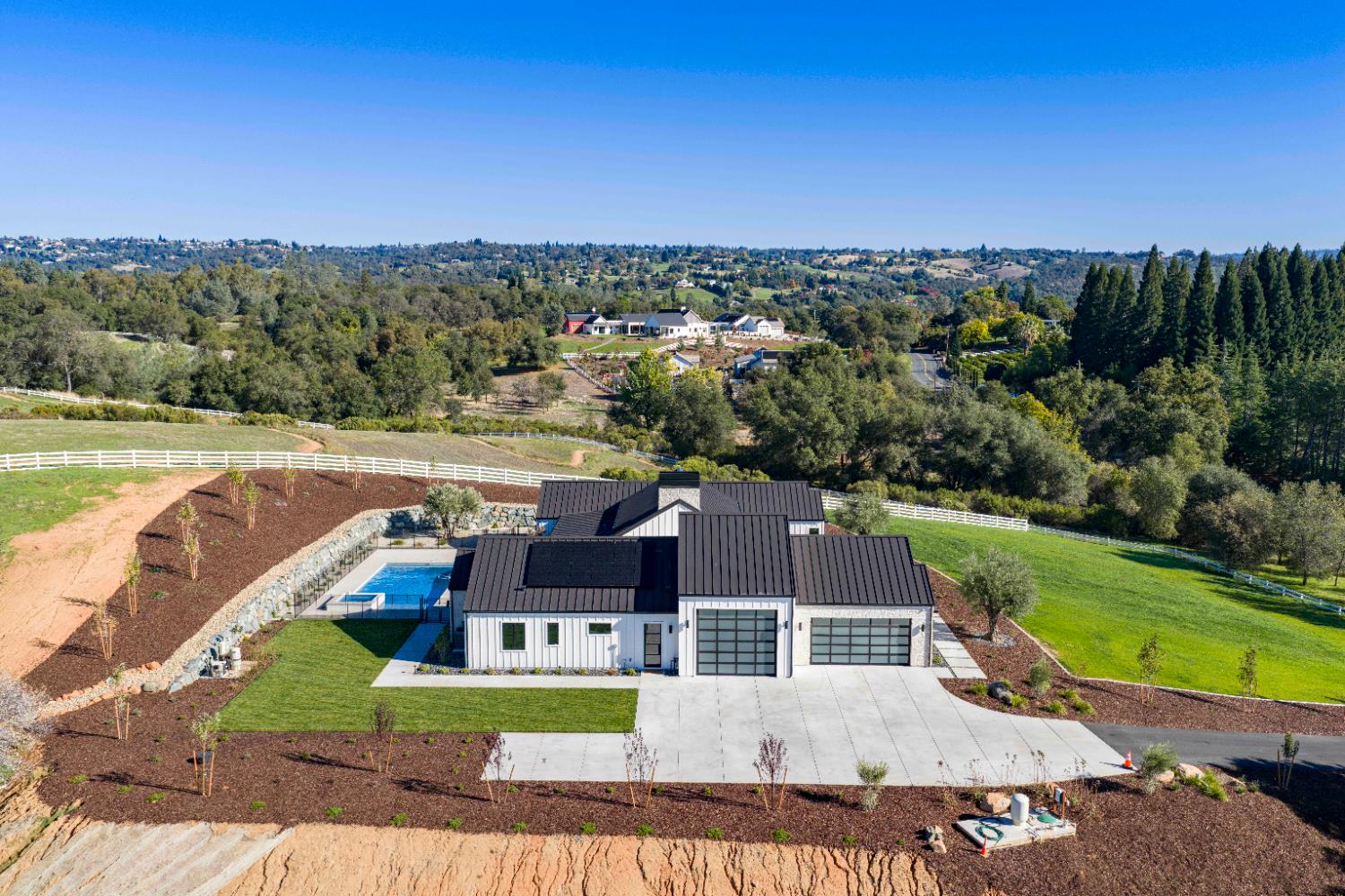 3140 Rattlesnake Road Newcastle, CA 95658 - Photo 64 of 78 an aerial view of a house with a garden and lake view