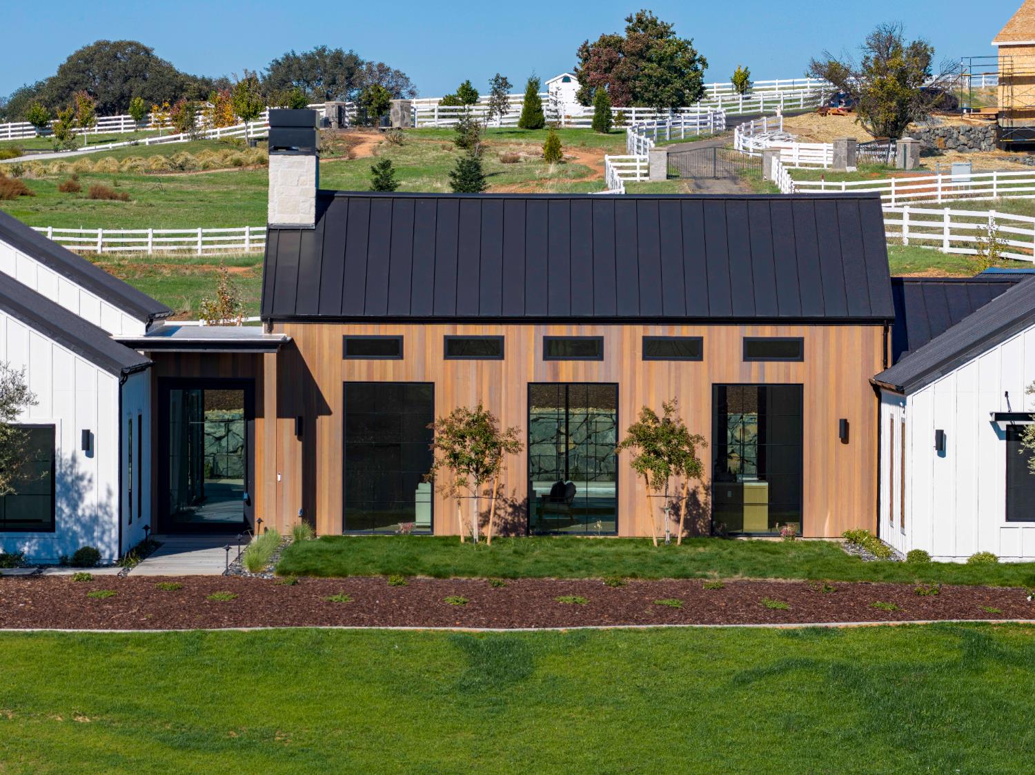 3140 Rattlesnake Road Newcastle, CA 95658 - Photo 76 of 78 a view of a house with a swimming pool and a yard