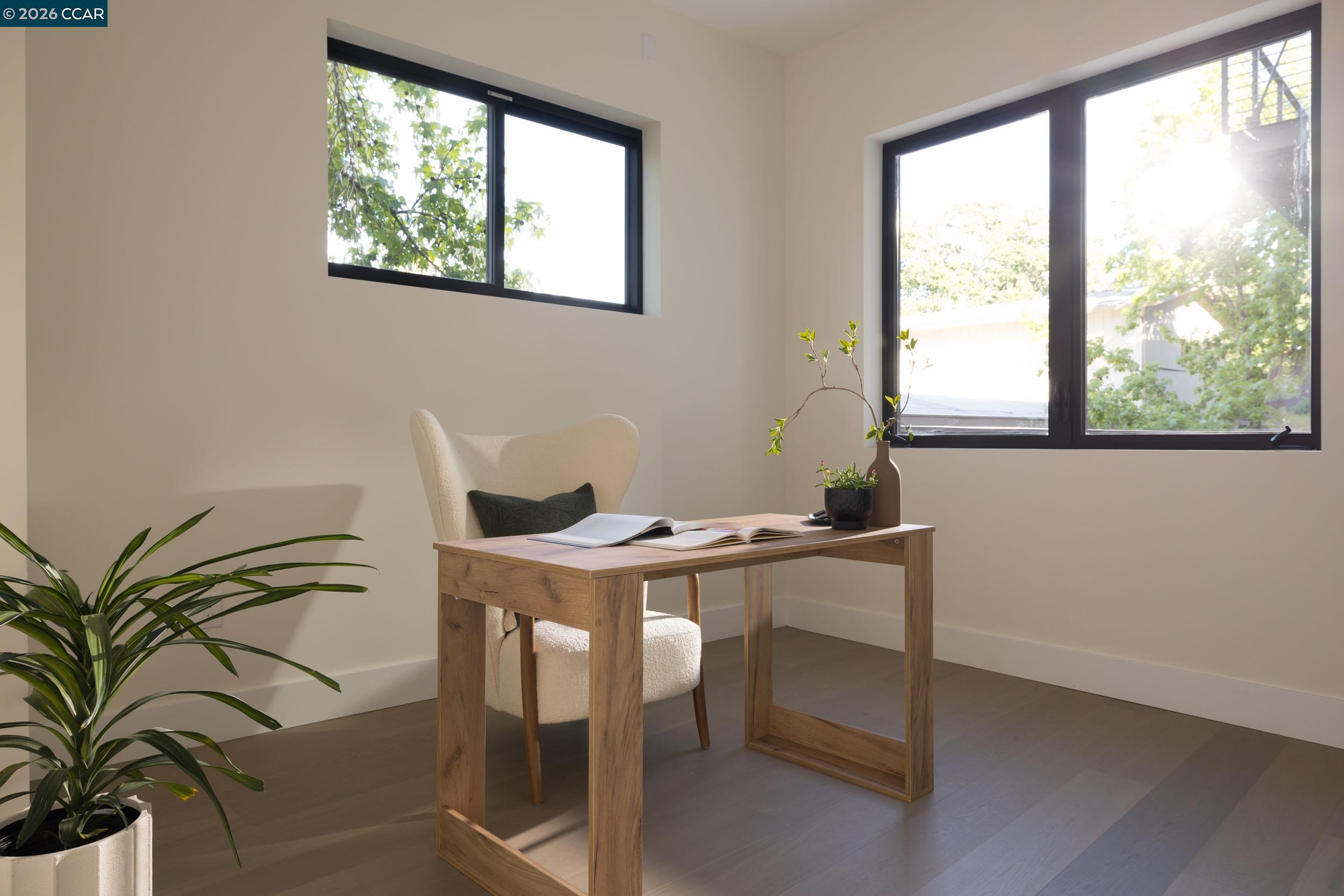 950 Hough Avenue, Unit 202 Lafayette, CA 94549 - Photo 22 of 38 a view of a workspace with furniture and a window
