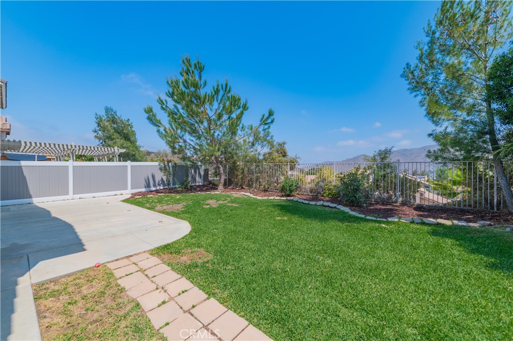 13090 Red Corral Drive Corona, CA 92883 - Photo 35 of 39 a view of backyard with swimming pool and outdoor seating