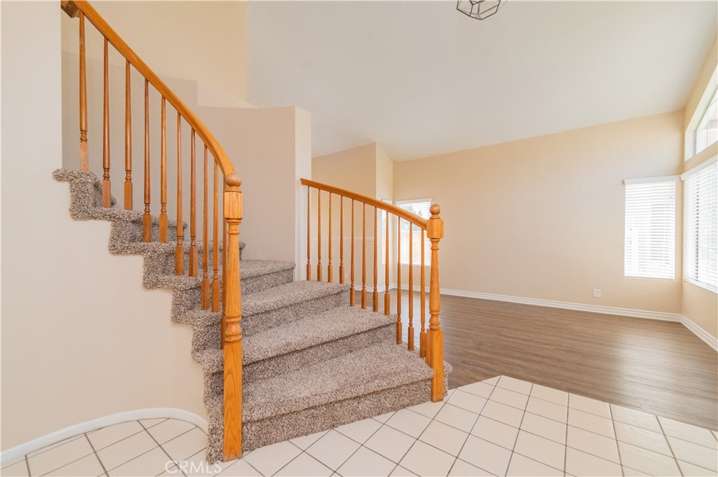 13090 Red Corral Drive Corona, CA 92883 - Photo 4 of 39 a view of an entryway with staircase