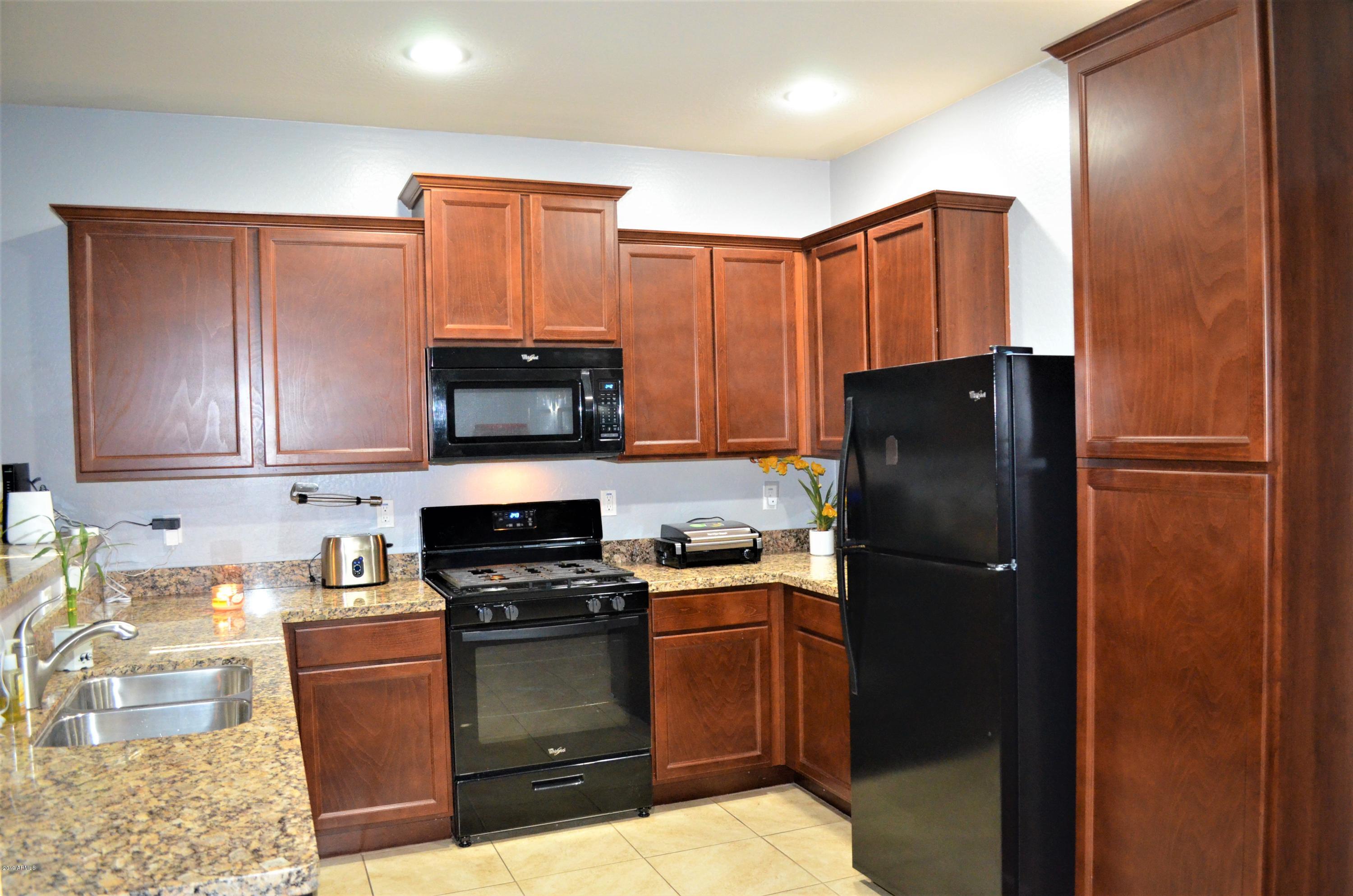 7710 West Carter Road Laveen, AZ 85339 - Photo 11 of 29 11 Kitchen with Granite