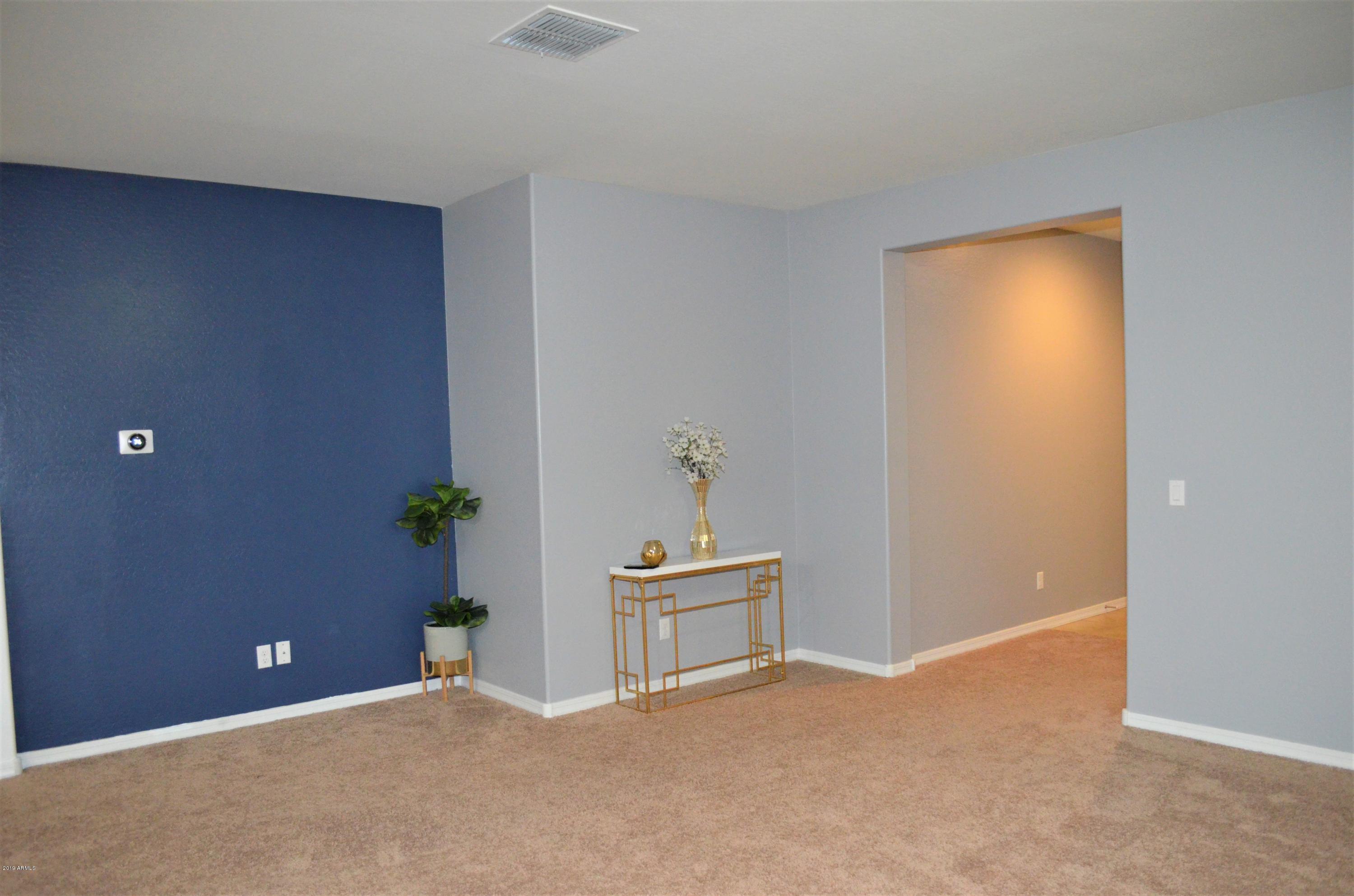 7710 West Carter Road Laveen, AZ 85339 - Photo 3 of 29 3 Living Room 2