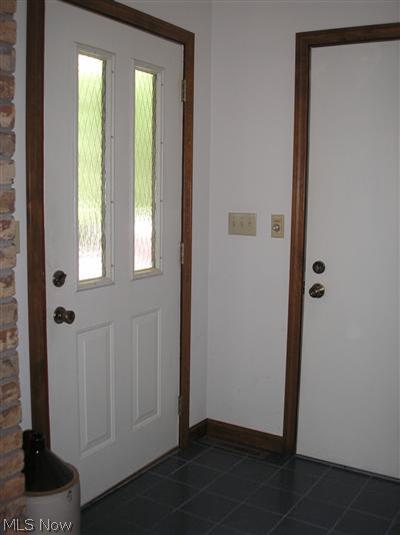 5710 Ridge Road Cortland, OH 44410 - Photo 19 of 23 Front foyer and door to garage
