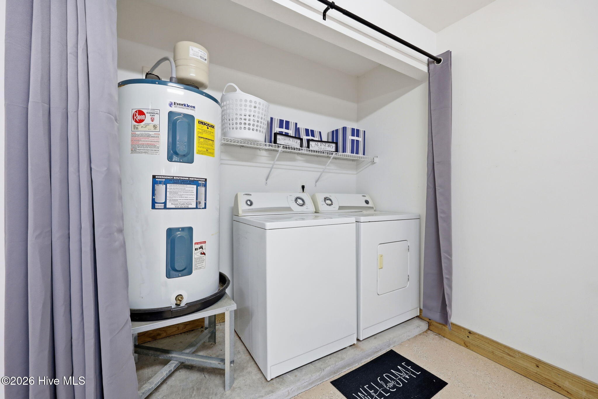 702 Hummingbird South Swansboro, NC 28584 - Photo 31 of 34 Laundry area in garage