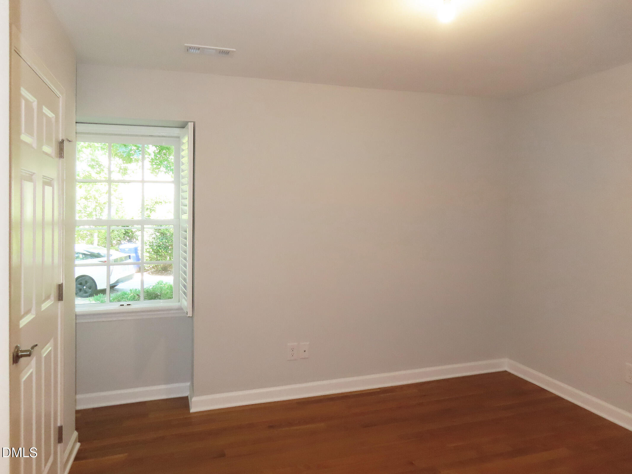 120 Weatherhill Point Carrboro, NC 27510 - Photo 11 of 25 an empty room with wooden floor and windows