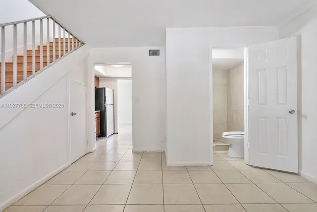 a view of an empty room with window