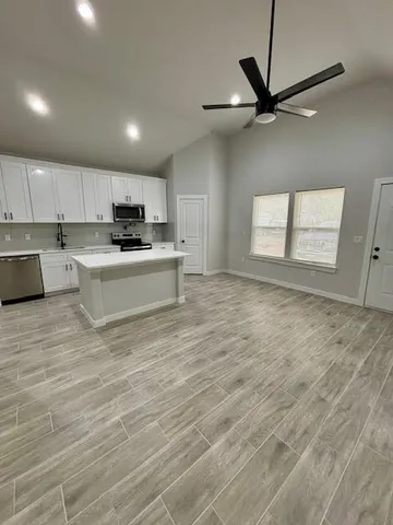 a view of kitchen and window