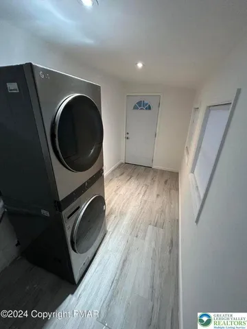 a view of utility room and washer dryer