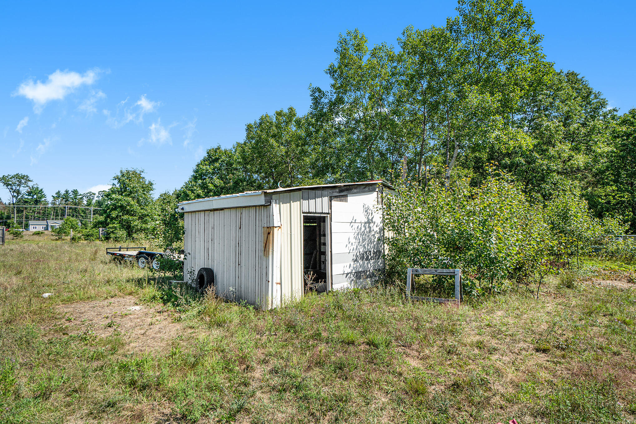 1082 Chatterson Road Muskegon, MI 49442 - Photo 35 of 37 Wood shed for alternate heat source
