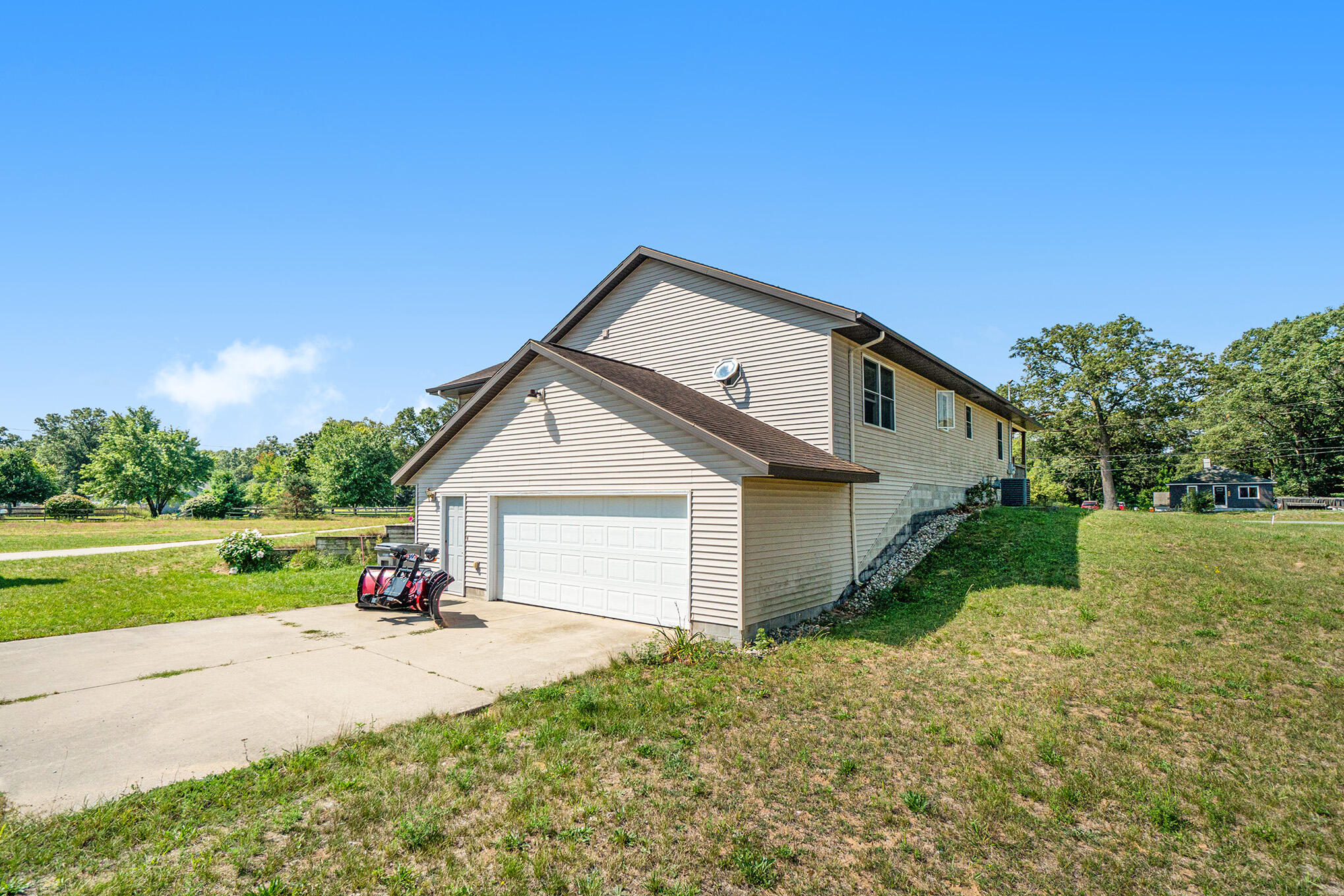 1082 Chatterson Road Muskegon, MI 49442 - Photo 4 of 37 Rear of house 2.5 stall Garage