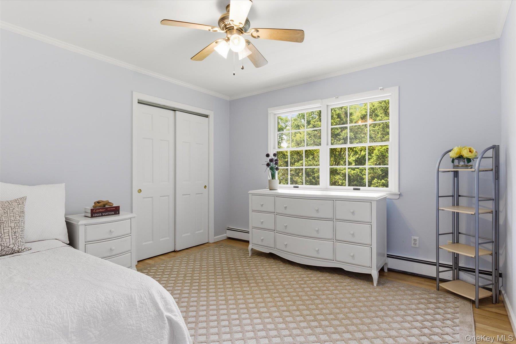 6 Brandy Road Cold Spring Harbor, NY 11724 - Photo 19 of 25 a room with a bed and a window