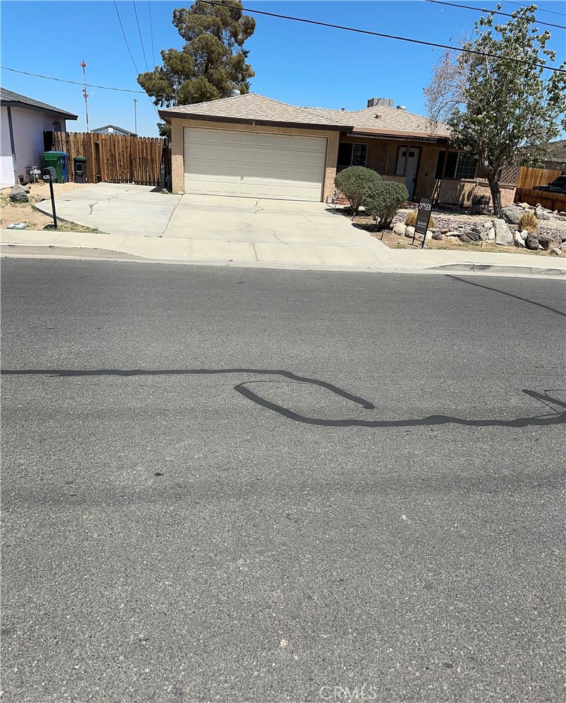 740 West Church Avenue Ridgecrest, CA 93555 - Photo 3 of 12 a view of street with a car parked on the road