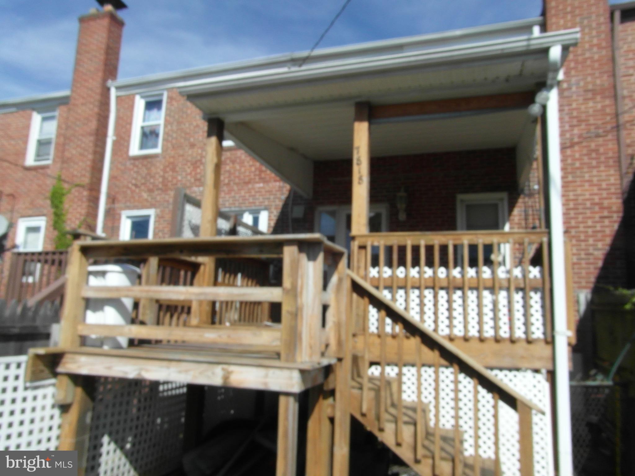 7818 New Battle Grove Road Baltimore, MD 21222 - Photo 3 of 13 a front view of a house with glass windows