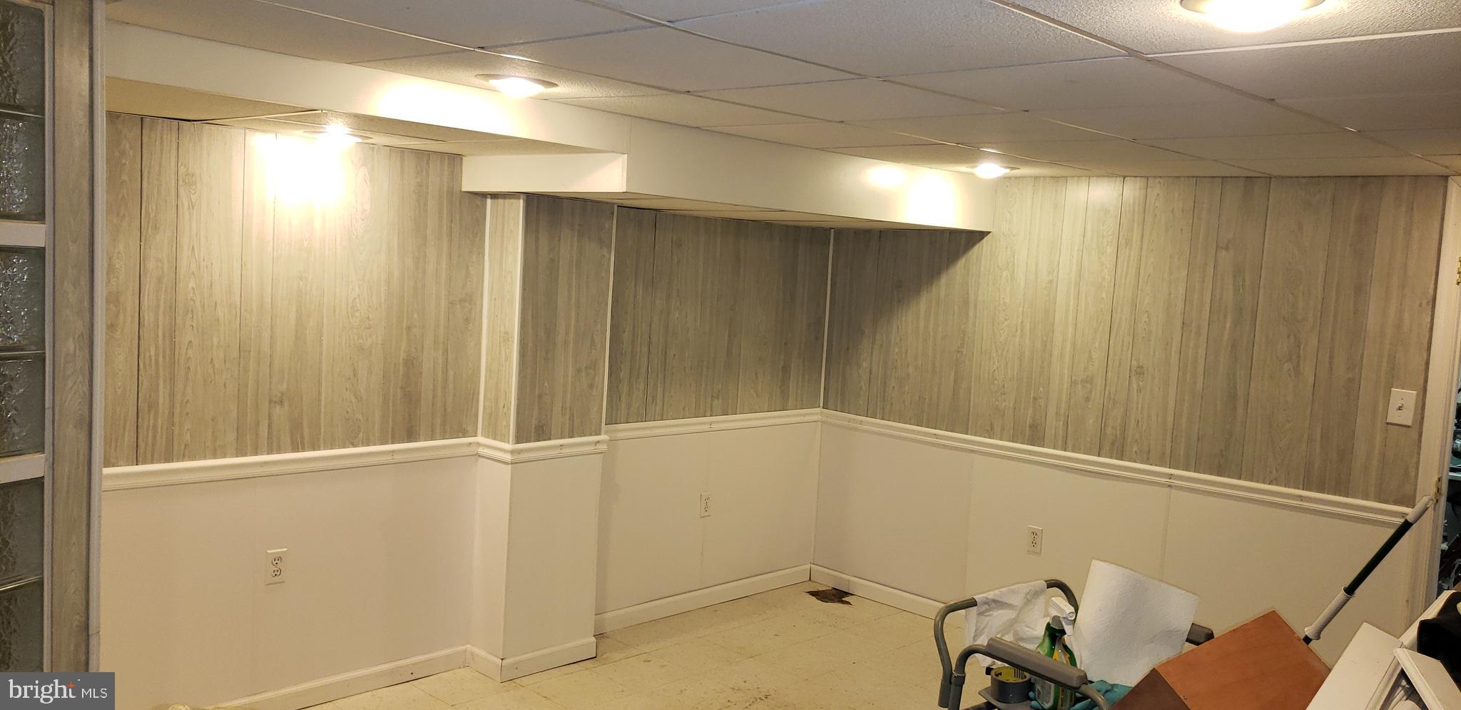 7818 New Battle Grove Road Baltimore, MD 21222 - Photo 7 of 13 a view of an empty room