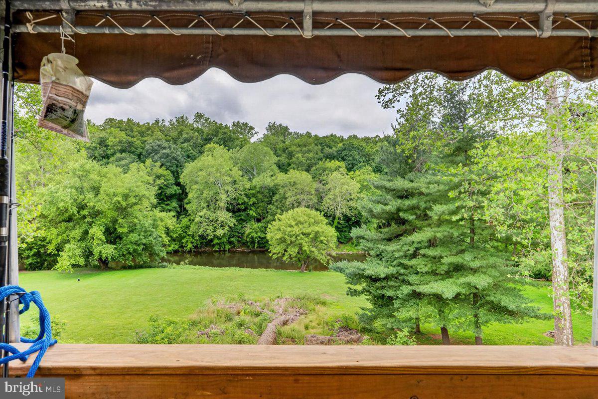 1865 Wilderness Road Lancaster, PA 17603 - Photo 39 of 39 Serene view of lush greenery and water.