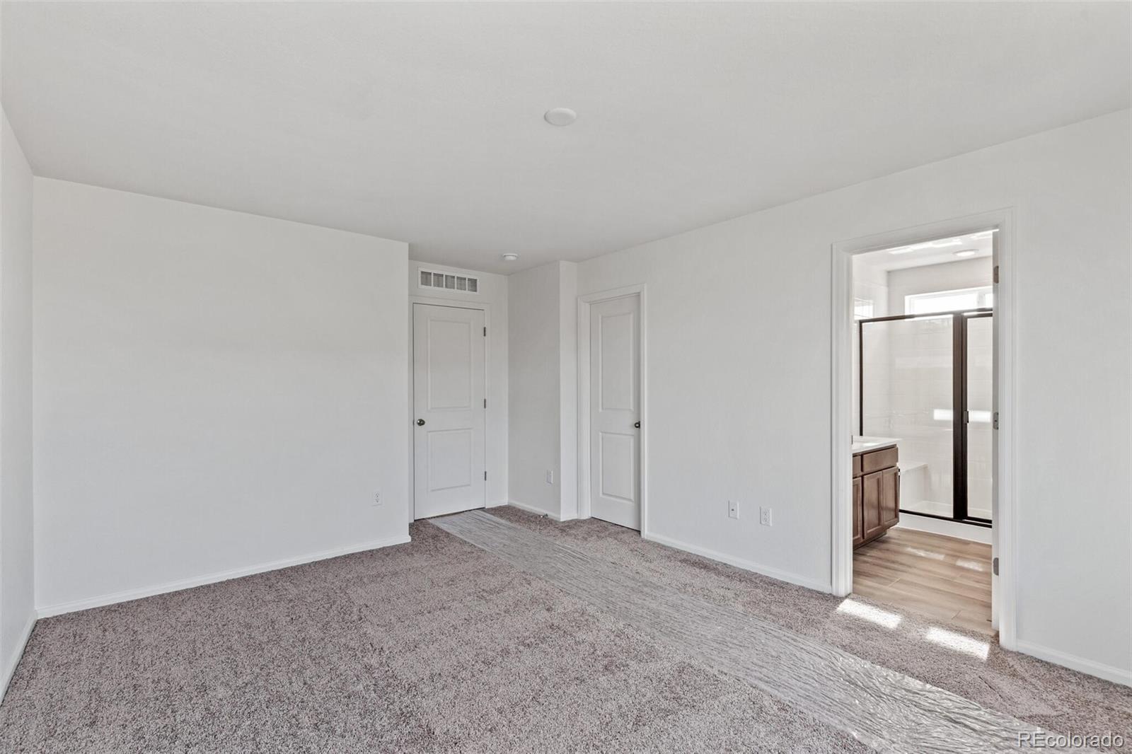 28636 East 6th Place Watkins, CO 80137 - Photo 20 of 32 a view of an empty room