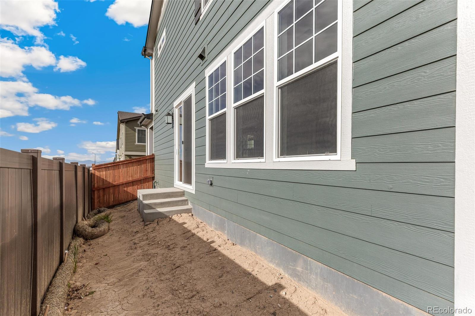 28636 East 6th Place Watkins, CO 80137 - Photo 28 of 32 a backyard of a house