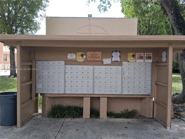 a front view of a house with parking area