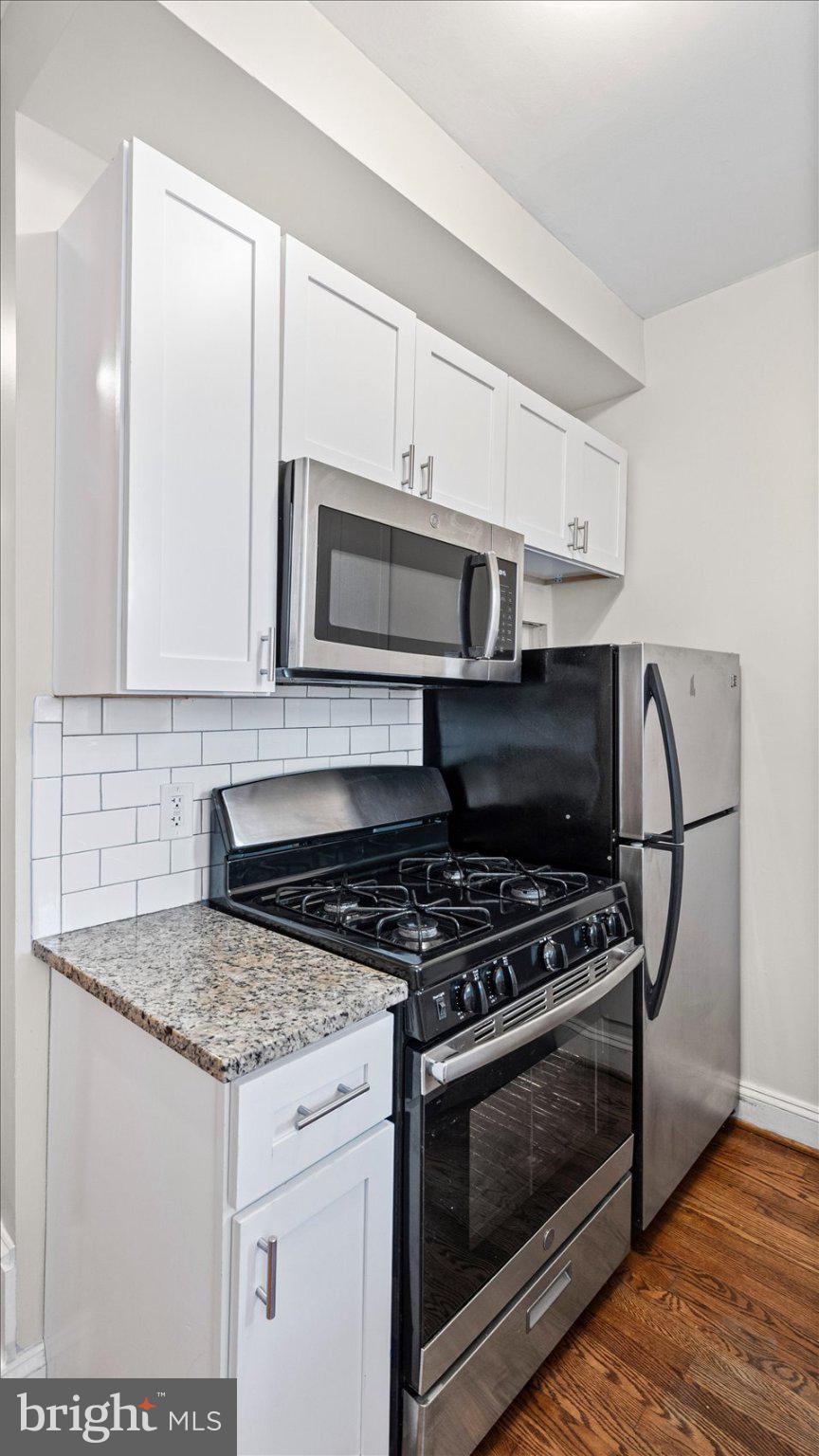 847 Carroll Street Baltimore, MD 21230 - Photo 29 of 33 Sleek kitchen with modern appliances.