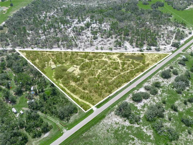 a view of swimming pool from a balcony