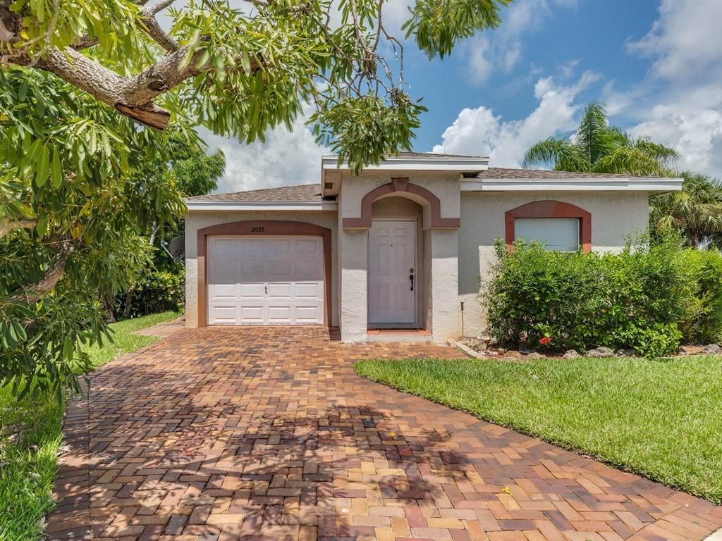 2093 East Ridge Circle East Boynton Beach, FL 33435 - Photo 1 of 25 002_Front