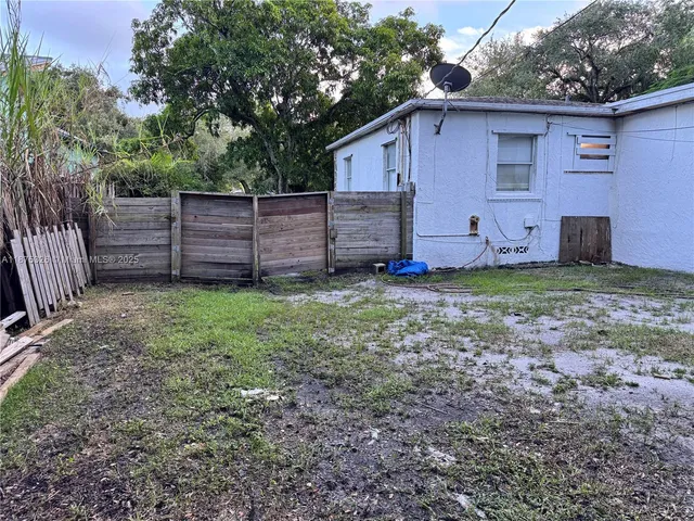 a view of outdoor space and yard