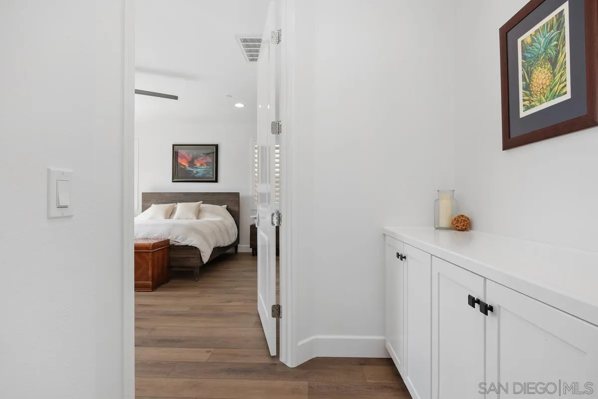 3741 Bergen Peak Place Carlsbad, CA 92010 - Photo 14 of 39 a bedroom with a bed and a window