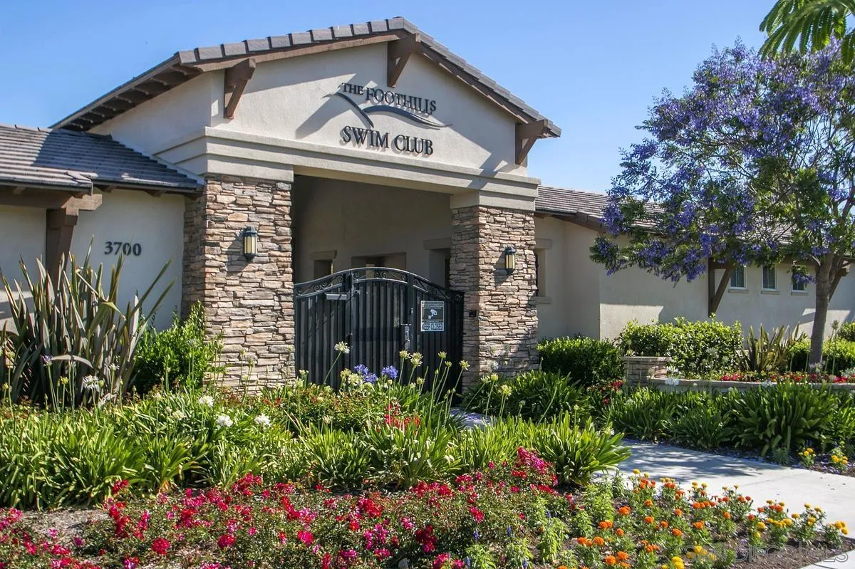 3741 Bergen Peak Place Carlsbad, CA 92010 - Photo 36 of 39 a view of a house with a flower garden