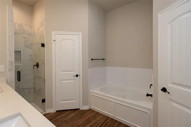 a bathroom with bathtub