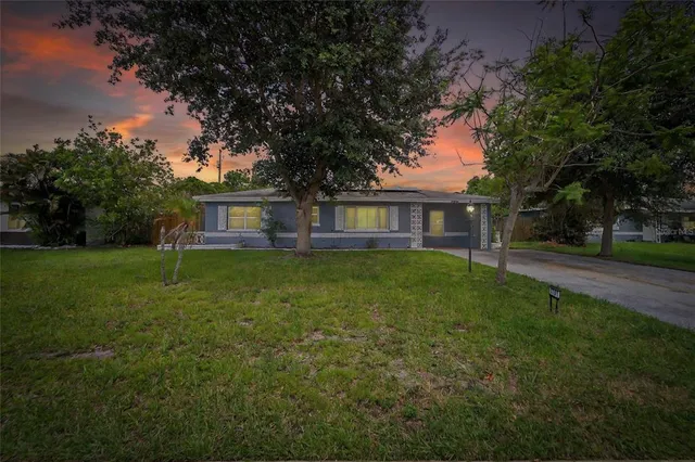 a house view with a garden space