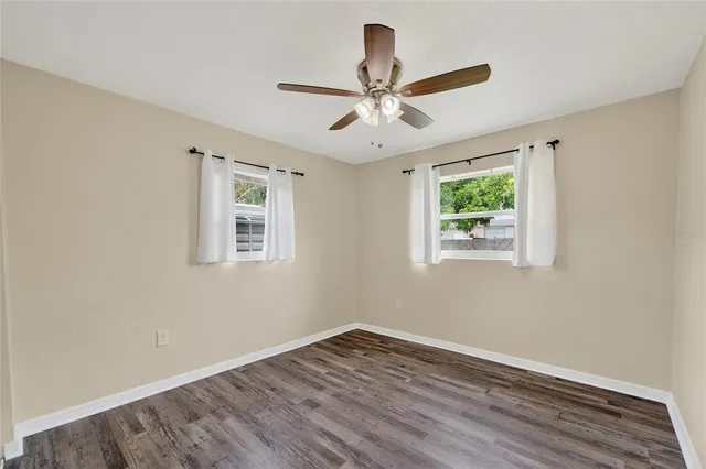 a bathroom with a shower and a toilet