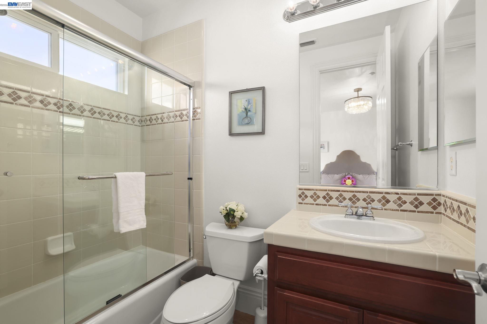 950 Winsford Court San Ramon, CA 94583 - Photo 51 of 68 a bathroom with a sink toilet and shower